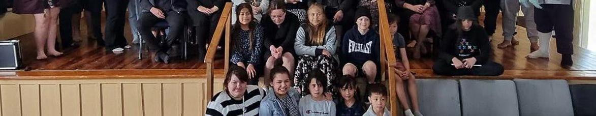 Some of our Peakman family- rangatahi sitting together at Whakaki marae, symbolising our whakapapa, stories and shared legacy.